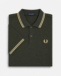 Polo de algodón doble banda verde Fred Perry