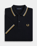 Polo de algodón doble banda negro dorado Fred Perry