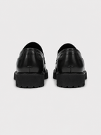 Mocasín de vestir negro con plataforma
