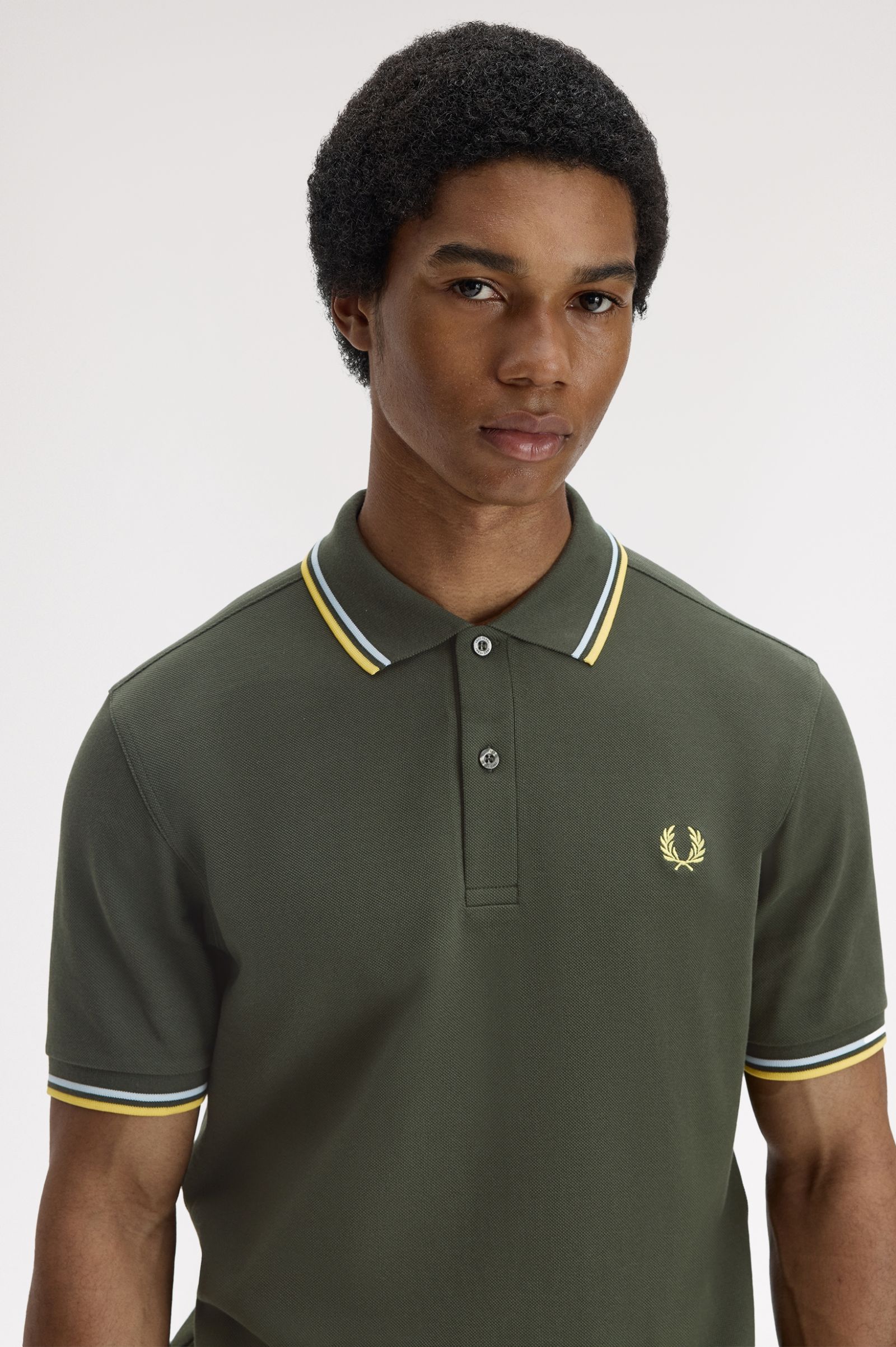 Polo de algodón doble banda verde Fred Perry
