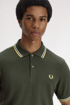 Polo de algodón doble banda verde Fred Perry