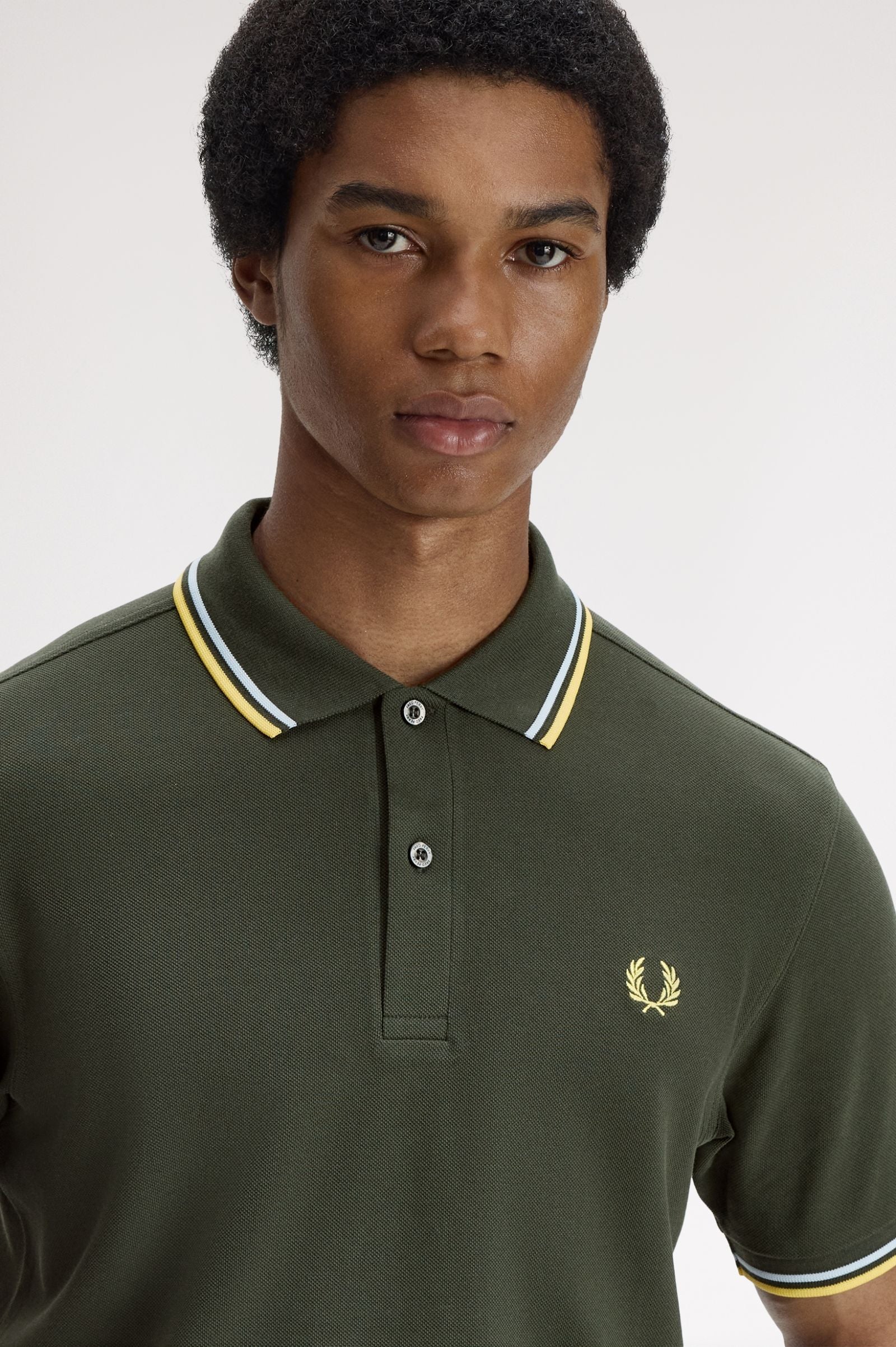 Polo de algodón doble banda verde Fred Perry