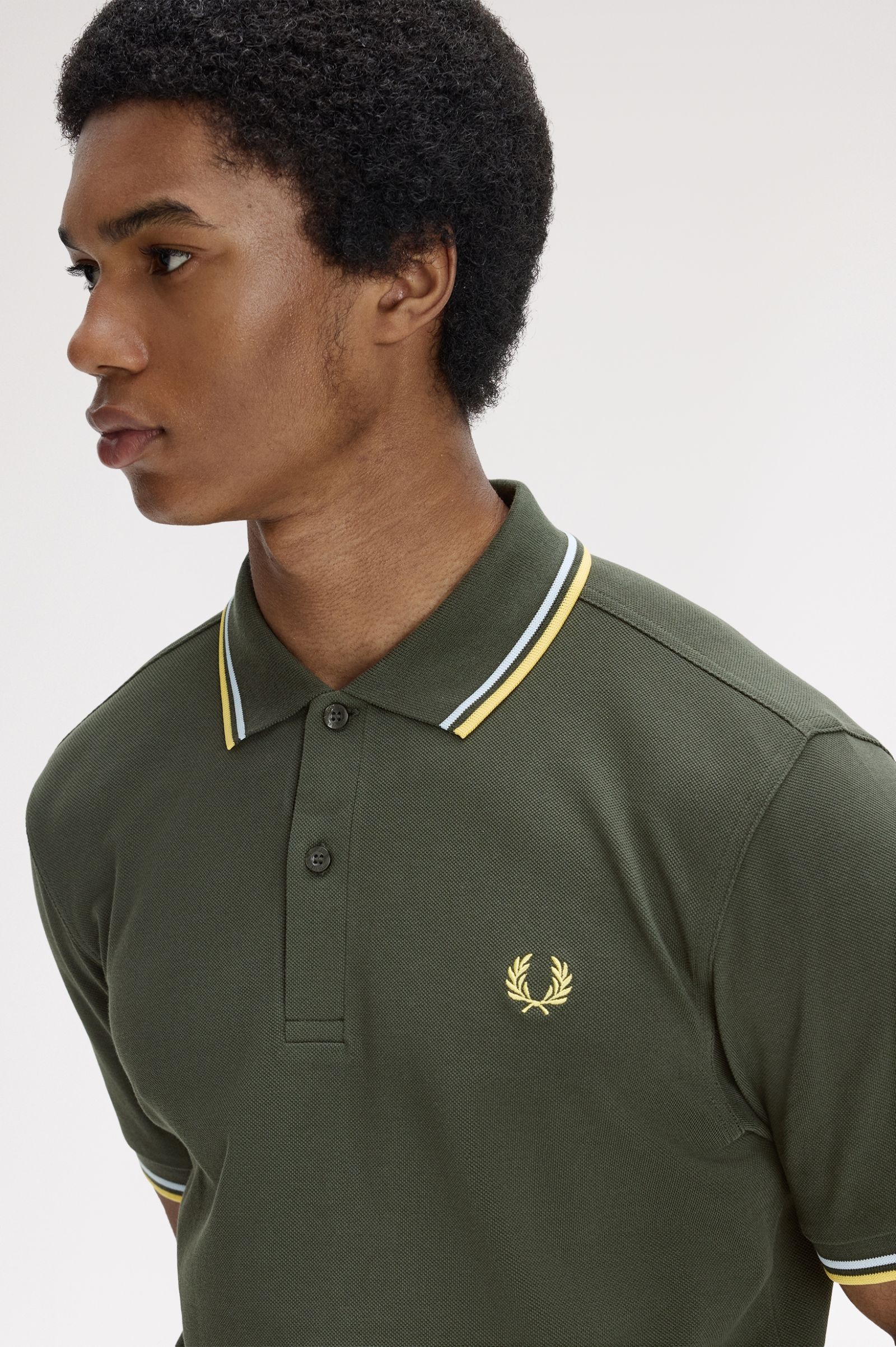 Polo de algodón doble banda verde Fred Perry