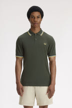 Polo de algodón doble banda verde Fred Perry