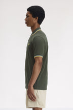 Polo de algodón doble banda verde Fred Perry