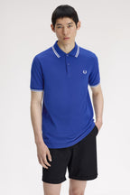 Polo de algodón doble banda azul Fred Perry