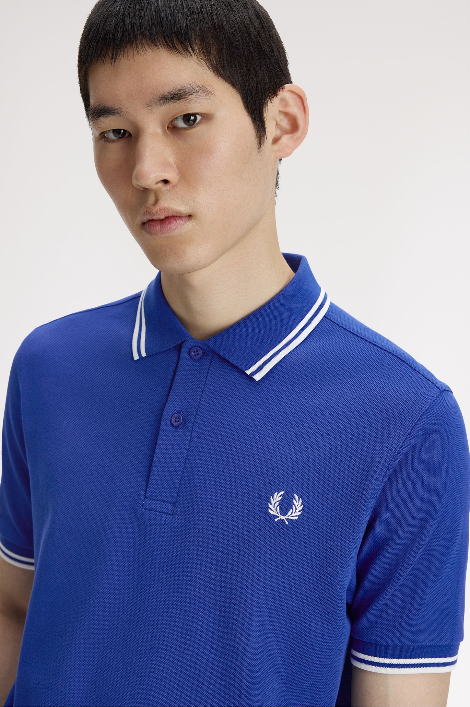 Polo de algodón doble banda azul Fred Perry