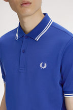 Polo de algodón doble banda azul Fred Perry