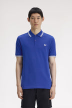 Polo de algodón doble banda azul Fred Perry