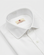 Camisa de algodón blanca lisa botón perlado