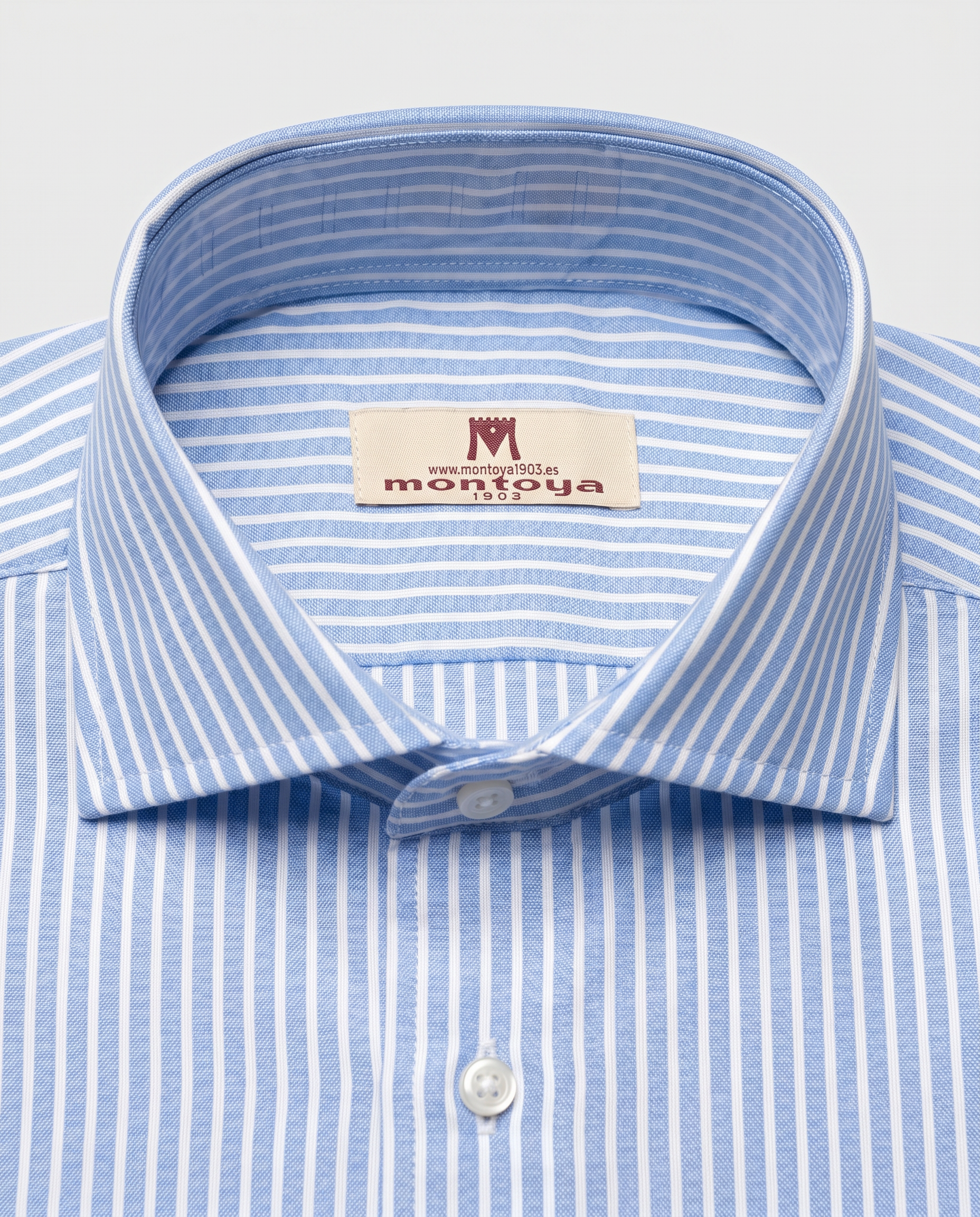 Camisa de algodón azul de rayas blancas
