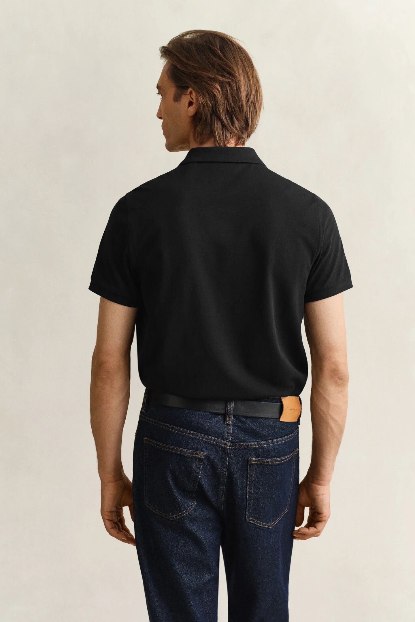 polo negro gant hombre vista trasera algodón corte cómodo